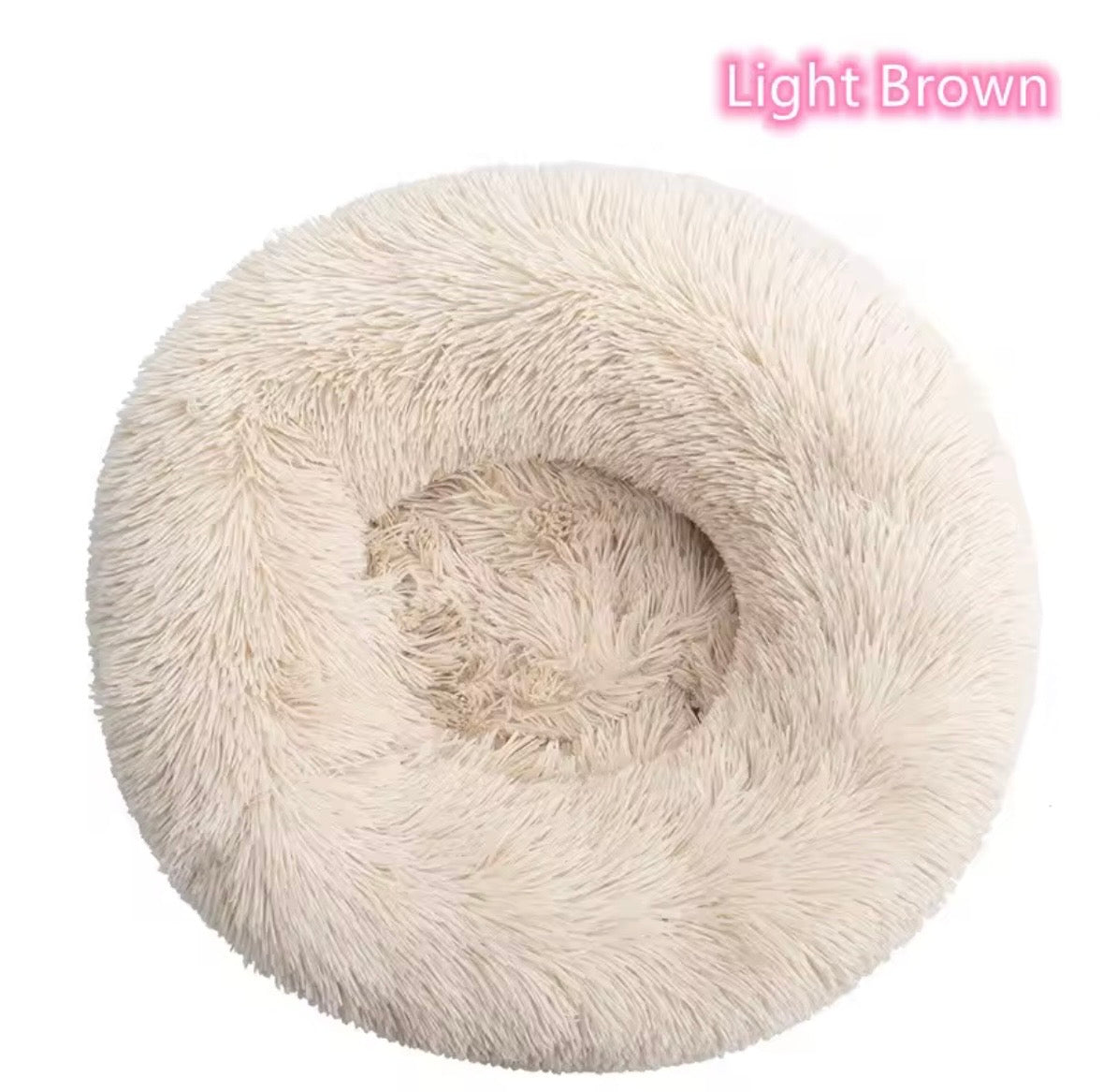 "Calming donut dog bed in light brown– front -view"