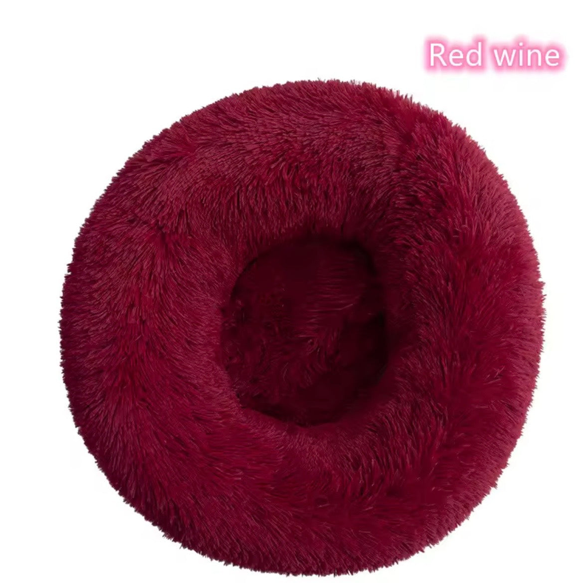 "Calming donut dog bed in wine red  – front view"