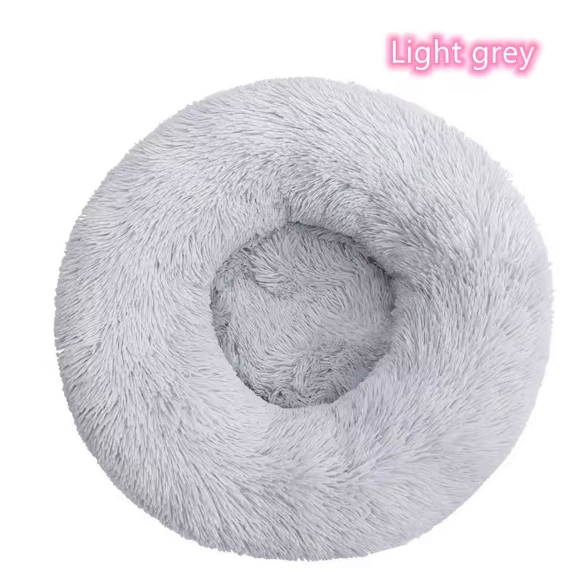 "Calming donut dog bed in Light grey color- in front view 
